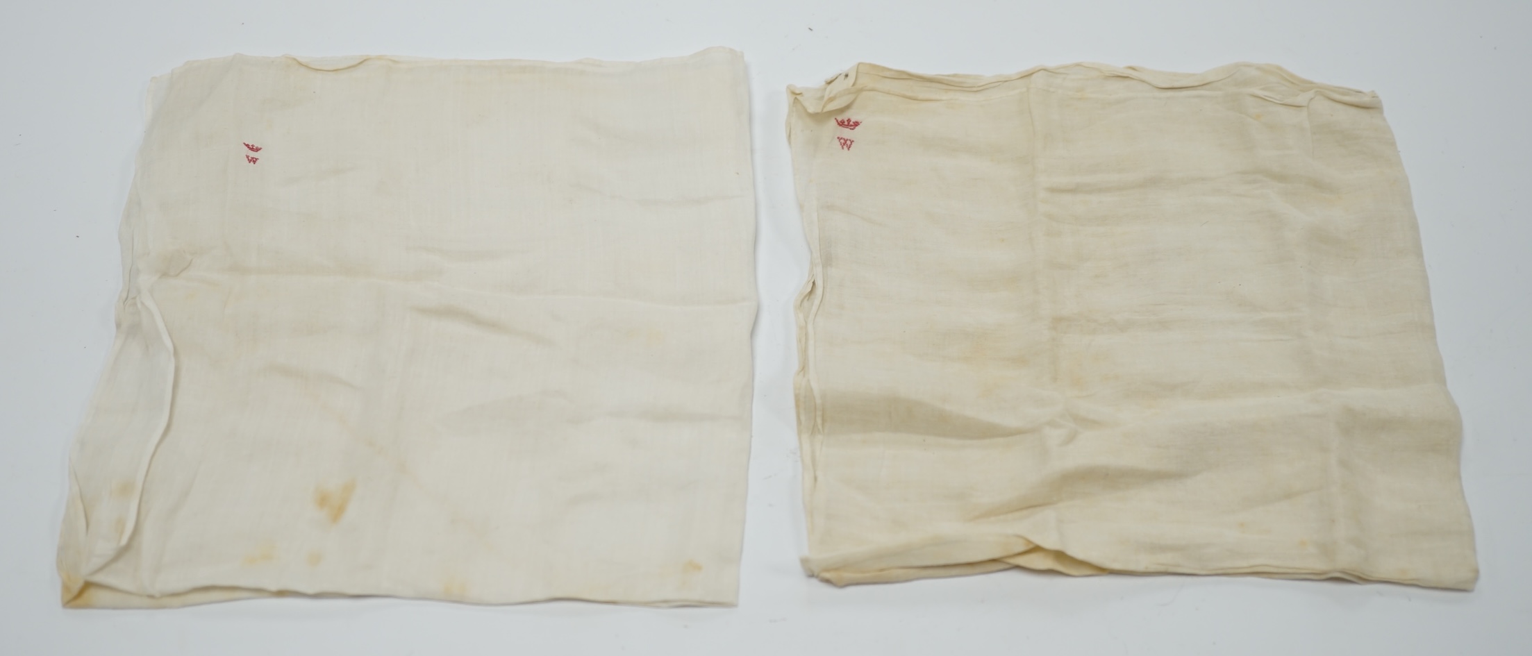 Two handkerchiefs each bearing an embroidered ‘W’ below a coronet, understood to be for the Duke of Wellington, 36 x 34cm. Condition - fair, some staining and foxing